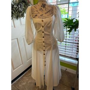 Free People's white maxie dress with bow, size xs